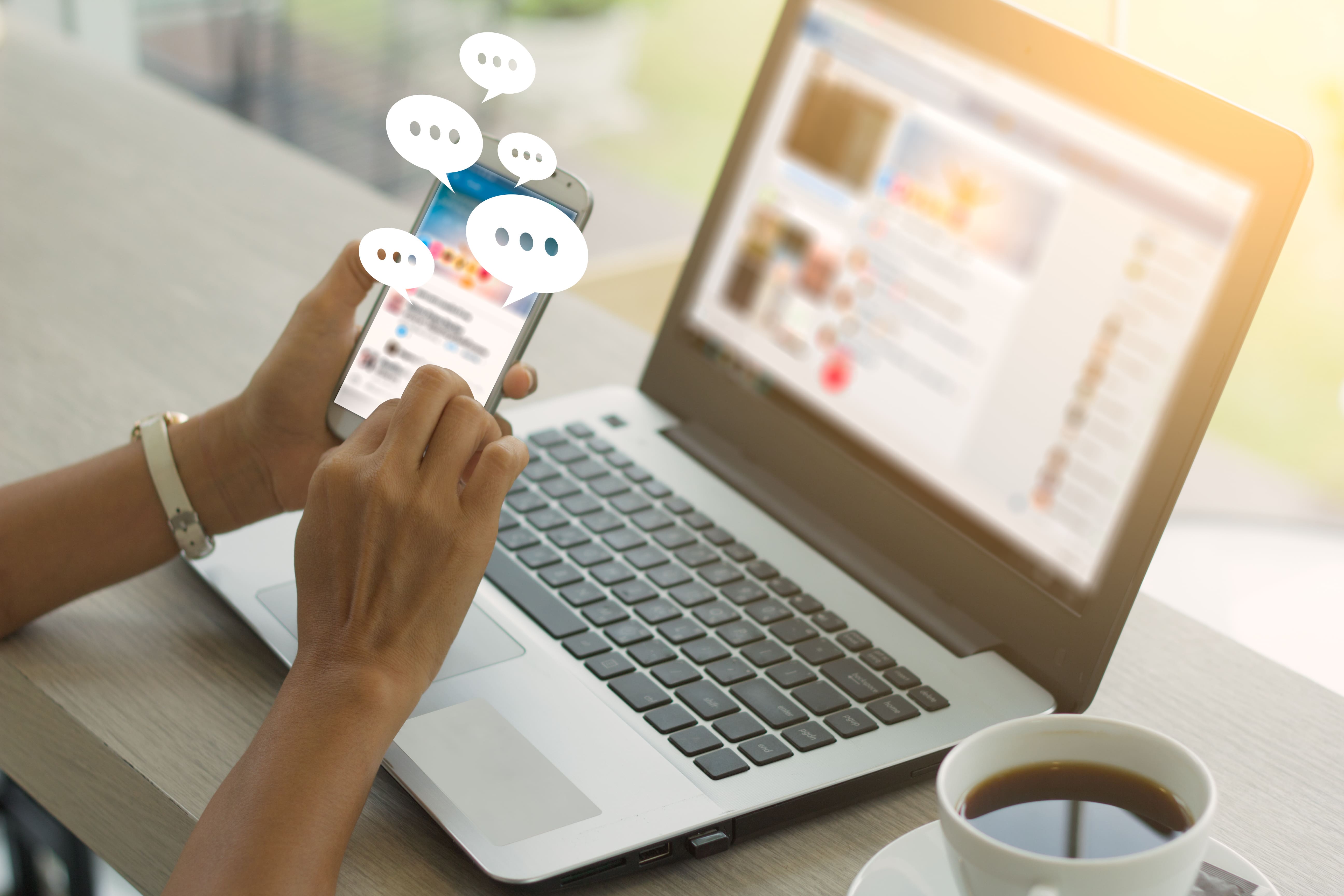 Woman using laptop searching on social media. a